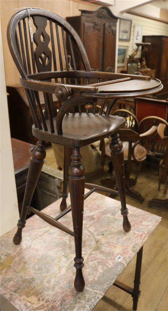 A childs oak high chair